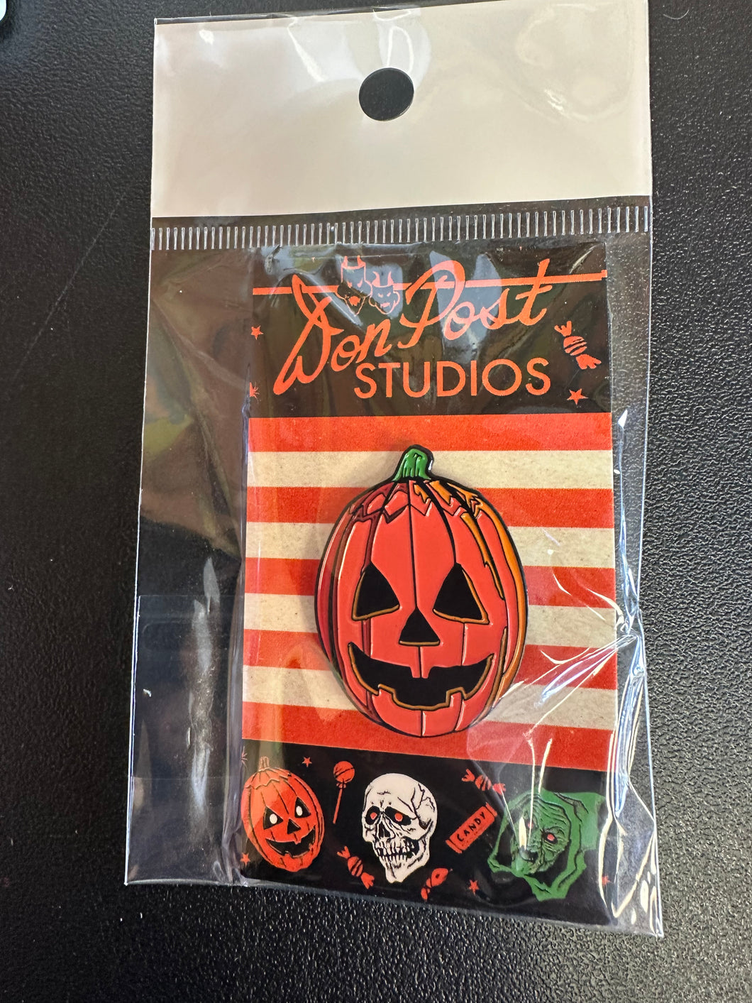 Don Post Pumpkin Mask Enamel Pin
