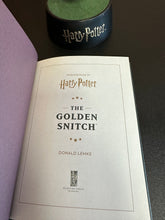 Load image into Gallery viewer, Harry Potter Floating Golden Stitch with Book Preowned
