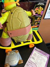 Load image into Gallery viewer, JAKKS PACIFIC TMNT XPV RC SKATEBOARDING MIKEY WORKS PREOWNED

