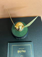 Load image into Gallery viewer, Harry Potter Floating Golden Stitch with Book Preowned
