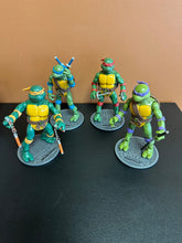 Load image into Gallery viewer, Teenage Mutant Ninja Turtles Classic Set of 4 Figures Preowned
