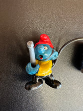 Load image into Gallery viewer, Schleich 1981 Peyo Smurf Fireman with Hose 2” Figure
