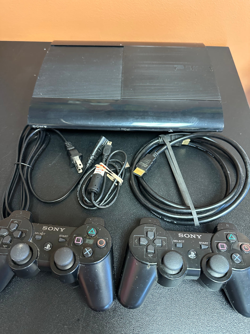 PlayStation 3 Super Slim PS3 Console with connections and 2 wireless controllers CECH-4001C Tested/Works