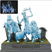 Load image into Gallery viewer, Disney Showcase Haunted Manison Hitchhing Ghost Light Up Statue Preowned
