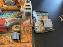 Load image into Gallery viewer, 1991 Galoob Micro Machines Military Super Van City fold-out playset.
