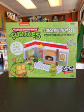 Load image into Gallery viewer, SNAP &amp; SWITCH TMNT Pizza Parlor With Mikey Construction Set
