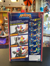 Load image into Gallery viewer, AKĒDO Ultimate Arcade Warriors Chux Lee VS Epic Crackup Mini Action Figures
