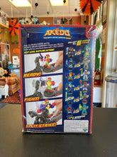 Load image into Gallery viewer, AKĒDO Ultimate Arcade Warriors Axel VS Epic Miss Slither Mini Action Figures
