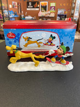 Load image into Gallery viewer, DEPARTMENT 56 Mickey’s Merry Christmas Village Mickey Catching Some Air
