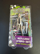 Load image into Gallery viewer, NECA BEETLEJUICE (1988) 7” SCALE FIGURE WITH BOOK &amp; SNAKE
