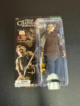 Load image into Gallery viewer, MEGO TEXAS CHAINSAW MASSACRE LEATHERFACE YELLOW CHAINSAW 8” CLOTHED FIGURE
