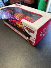 Load image into Gallery viewer, Jada Hollywood Rides Cars
Lightning McQueen (Ex Tire Rack Edition) 1:24 Scale
