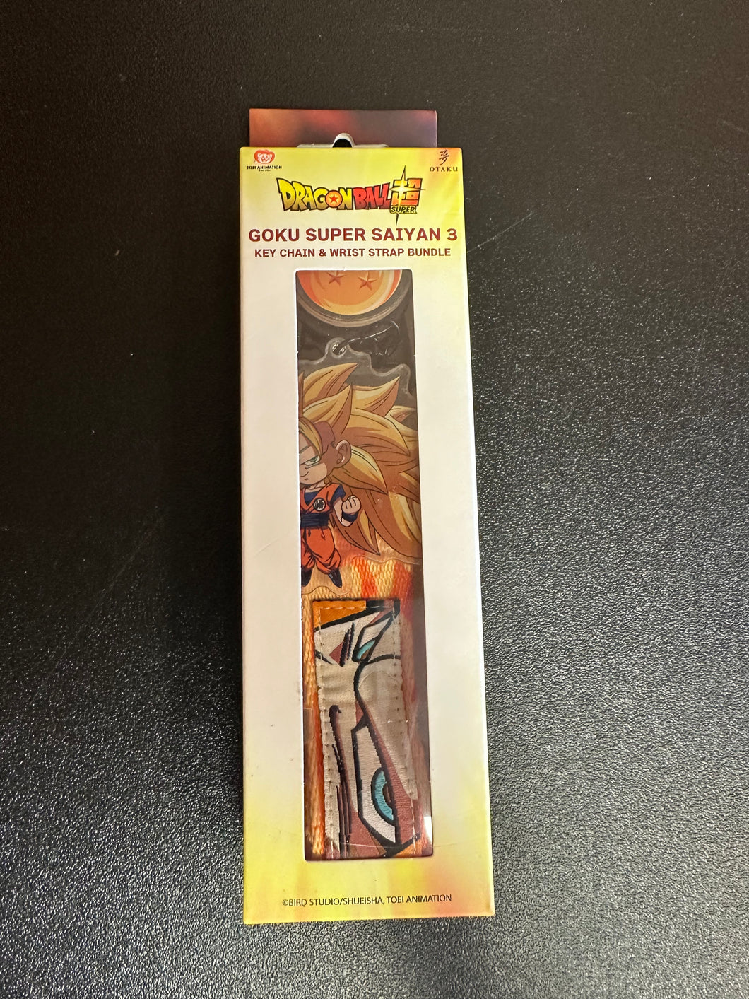 Dragonball Super Goku Super Saiyan 3 Keychain & Wrist Strap Bundle