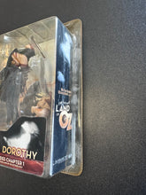 Load image into Gallery viewer, McFarlane Toys Twisted Land of Oz Dorothy Chapter 1 Series Two Yellow DMG Package

