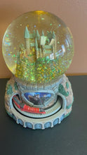 Load and play video in Gallery viewer, Harry Potter Hogwarts Express Illuminated 8&quot; Tall Musical Globe Preowned
