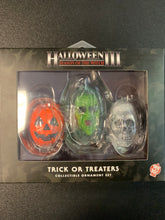 Load image into Gallery viewer, HOLIDAY HORRORS - HALLOWEEN III: SEASON OF THE WITCH - SILVER SHAMROCK ORNAMENT 3 PACK TRICK OR TREATERS SET
