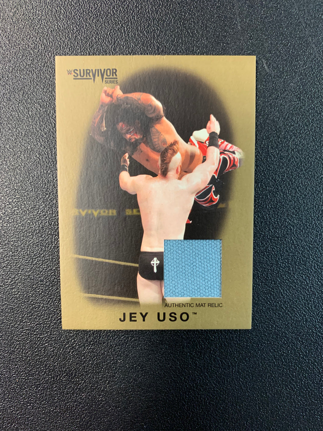 TOPPS WWE SURVIVOR SERIES RING MAT RELIC GOLD JEY USO 02/10