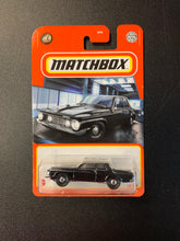 Load image into Gallery viewer, MATCHBOX BLACK 1962 PLYMOUTH SAVOY 12/100
