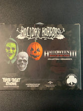 Load image into Gallery viewer, HOLIDAY HORRORS - HALLOWEEN III: SEASON OF THE WITCH - SILVER SHAMROCK ORNAMENT 3 PACK TRICK OR TREATERS SET
