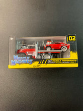 Load image into Gallery viewer, MUSCLE MACHINES MODEL 02 DIECAST 1:64 MUSCLE TRANSPORTS 1966 CHEVROLET C60 FLATBED/1969 CHEVROLET CAMARO SS
